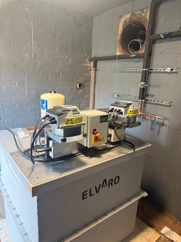 Twin pump cold water booster set installed in the plant room at Kestral House School