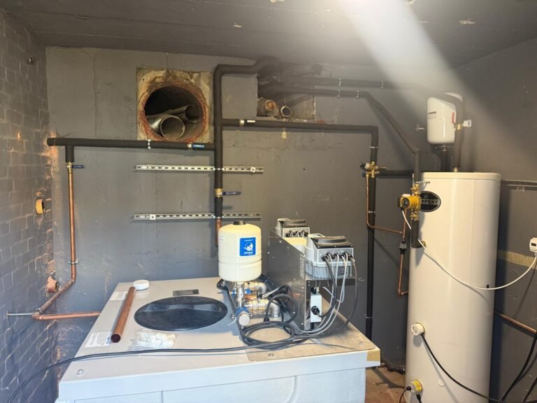 Plant room at Kestral House School with the new cold water booster pump set and water heater